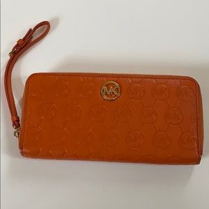 Beautiful orange leather Michael Kors wallet